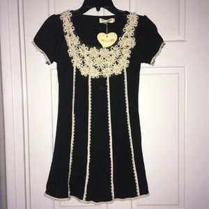 Angel Eye black w/cream flower design shirt, S/M